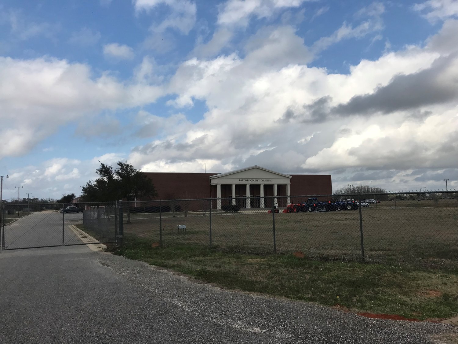 The fence in the front of the Baldwin County Coliseum site would be moved back and replaced by hedges under a city of Robertsdale plan for the site. Flower beds and a sidewalk would also be added.