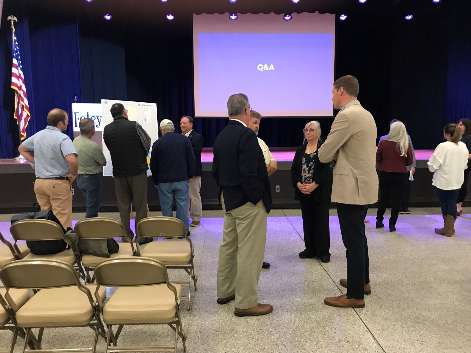 Audience members talk to local officials in Foley during one of four meetings to discuss the Baldwin County long-range land-use plan.