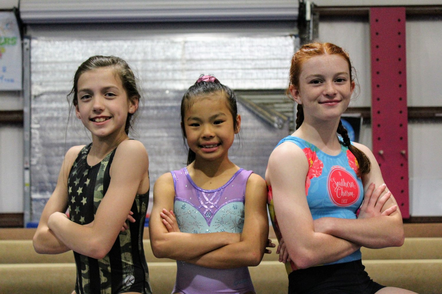 LEFT: Eastern Shore Gymnastics Academy gymnasts (from left) Rylee Cumpston, age 10 of Spanish Fort, Rosie Roberds, age 8 of Fairhope qualified for Xcel Platinum regionals and Luci LeCroy, age 11 of Fairhope, qualified for Xcel Gold regionals.
