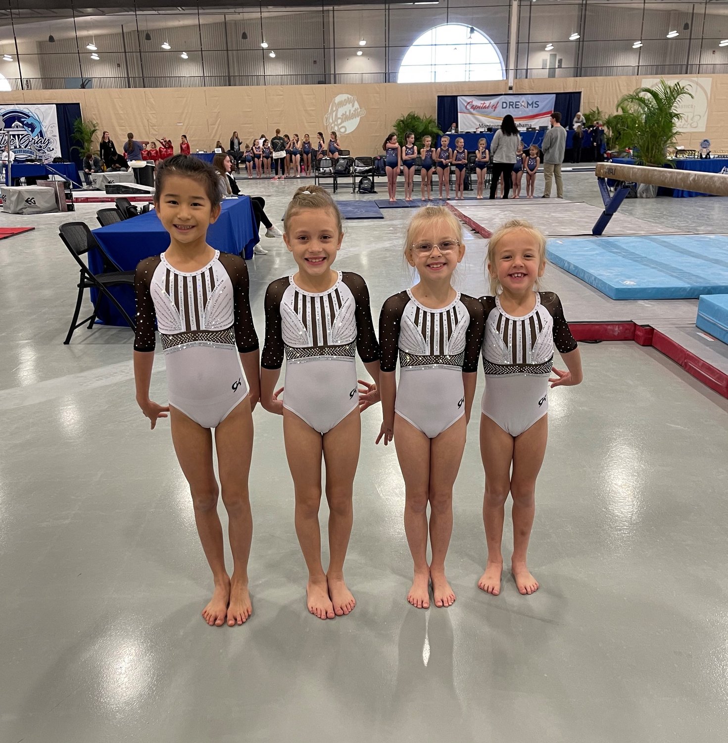 The Eastern Shore Gymnastics Academy's Xcel Bronze team won third place team overall at the Alabama Xcel State Championship. From left are Angela Taniguchi, Eden Cryar, Maci Edwards and Maggie Myrick.