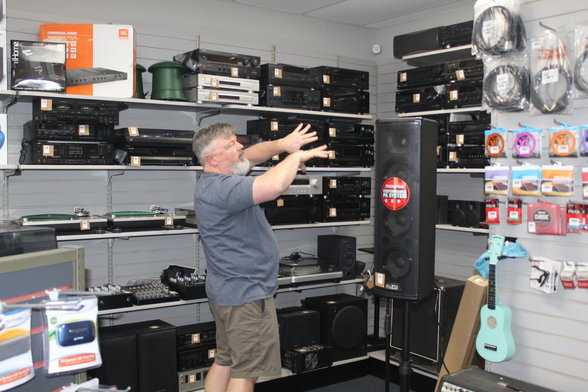 Wade Wellborn, owner of Dr. Music Audio, shows the wide variety of audio equipment and accessories.