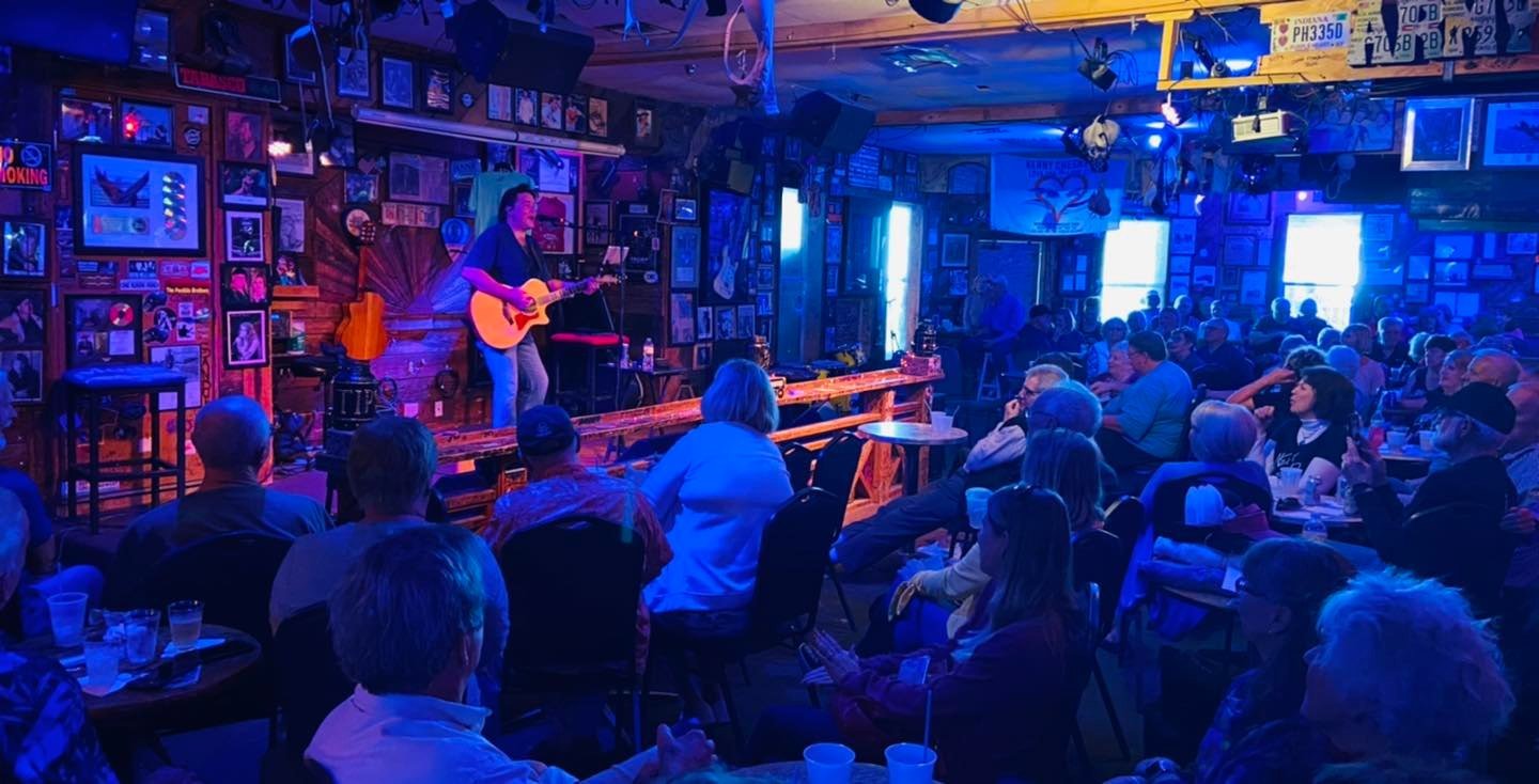 Neil Dover performs to a full house at the Flora-Bama.