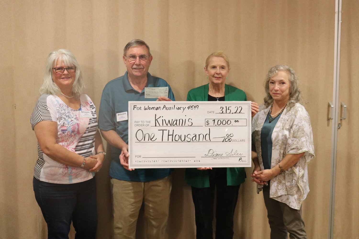 From left, Lady Auxiliary and Kiwanian June Walosz, Kiwanis Club of Foley President Russ Morrison, FOE Ladies Auxiliary President Diane Siler, and Past President Sandy Phonessa. The FOE Ladies Auxiliary presented a donation of $1,000 to the Foley Kiwanis Club on March 15.