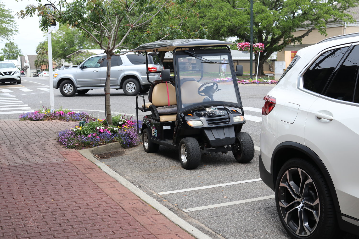 Parking space designation for cars and golf carts was among the items discussed Monday, April 11, by the Fairhope City Council during consideration of a development proposal.