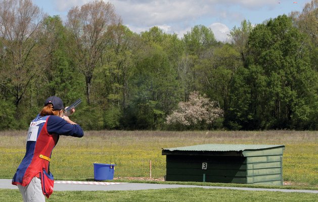 Grace Fulton of Tucson, Arizona, breaks a target during her gold medal round at Red Eagle Skeet and Trap Club in Childersburg.
Grace Fulton of Tucson, Arizona, breaks a target during her gold medal round at Red Eagle Skeet and Trap Club in Childersburg.