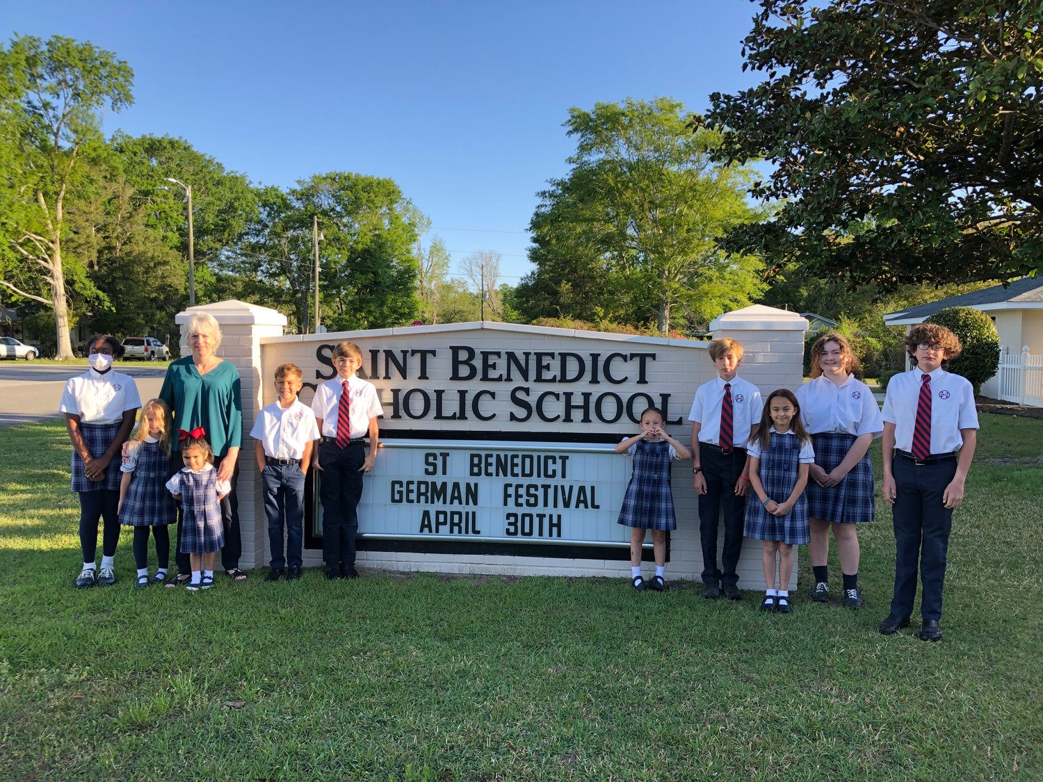 Pictured here, from left: Shariann Simms, Carsyn Faulk, Dr. Kathy McCool, Kimber Hicks, Grayson Box, John Michael Schumacher, Madison Braughton, Walker Box, Hadley Verret, Annabel Ewing, and Tripp Vogtner. St. Benedict staff and students are gearing up for the upcoming German Festival.