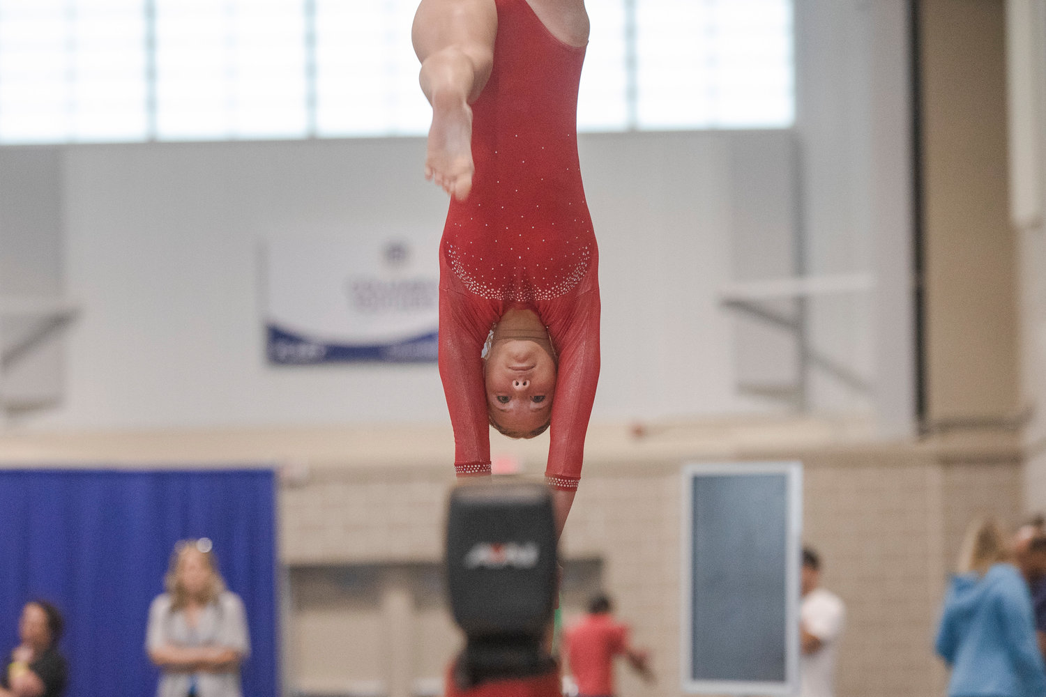 FCA gymnast Saoirse McDaniel competes her Xcel Gold balance beam routine.