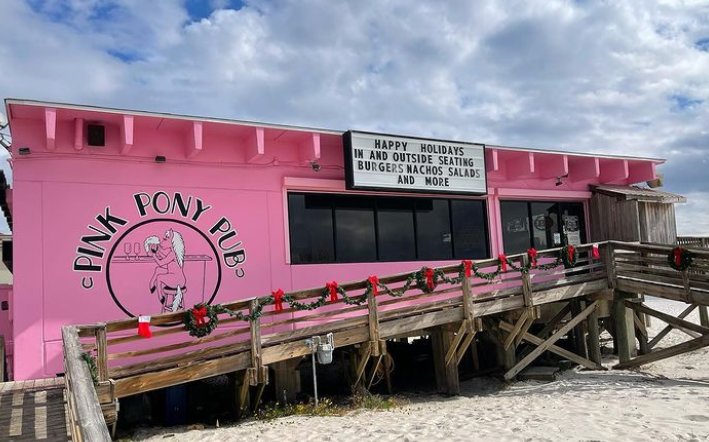 Pink Pony Pub is an iconic beach front spot to grab a bite and a frosty beverage.