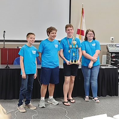 The middle school varsity first-place team was the Baldwin County Virtual School. Team members were from left: Colton Johnson, Will Brunson, Jacob Warner, and Zella Haymon.