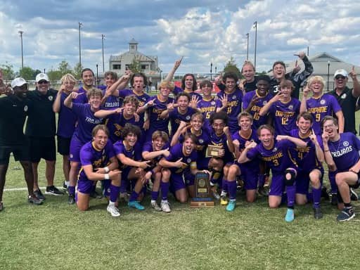 The Daphne Trojans claimed the AHSAA Class 7A State Championship for their first Blue Map trophy in program history with a 2-0 win over Oak Mountain Saturday, May 14, in Huntsville.