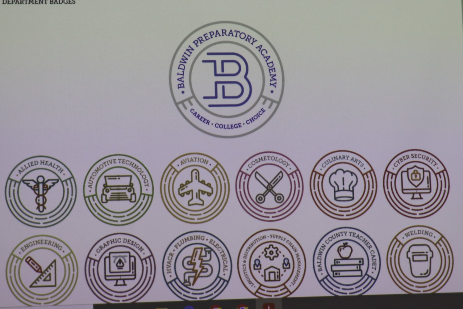 Designs were revealed showing badges that will be worn by students attending Baldwin Preparatory Academy. Students will be assigned specific badges reflecting their industry of choice.