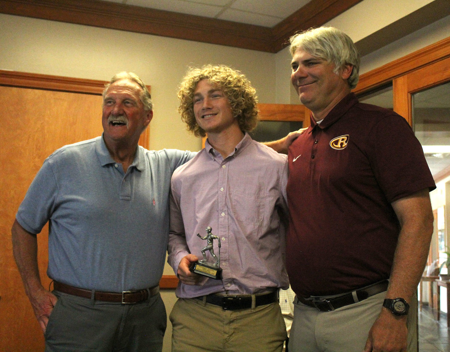 Robertsdale’s Kobe Wiggins was honored as one of Midtown Optimst Club’s Extraordinary Eight and was presented the award by Randy McGilberry at the Azalea City Golf Course in Mobile during the May 25 luncheon. He was joined by Golden Bear Head Coach Peter Bezeredi.