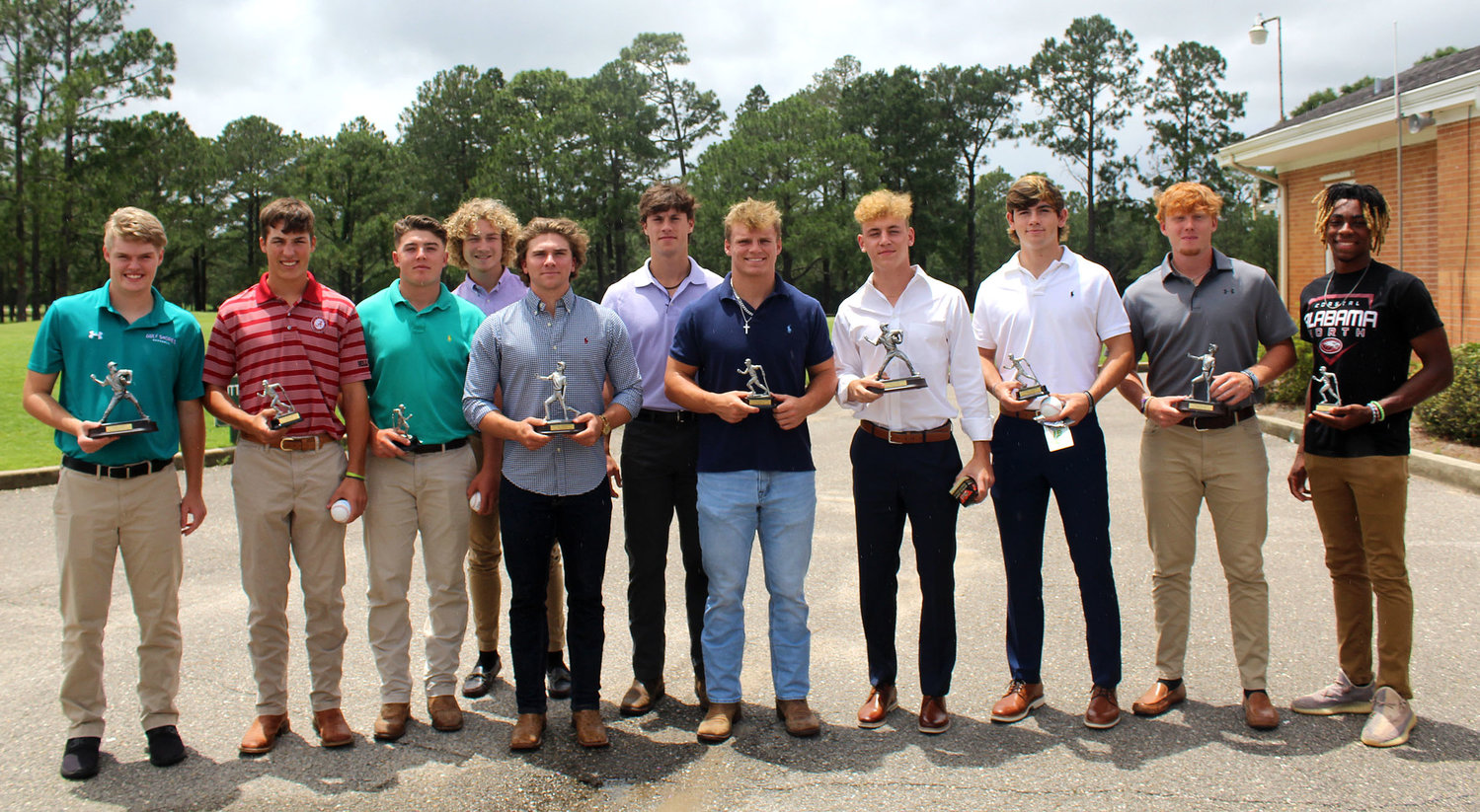 Midtown Optimist Club’s Terrific Twelve were recognized at an awards luncheon at the Azalea City Golf Course May 25. Pictured from the left are Case Hager, Matthew Milner, C.T. Englebert, Kobe Wiggins, Zane Stokes, Charlie Keller, Grant Jay, Camden Diamond, Kyle Hipp, Jackson Howard and Brandon Cain. Not pictured is Breyton Cornelius.