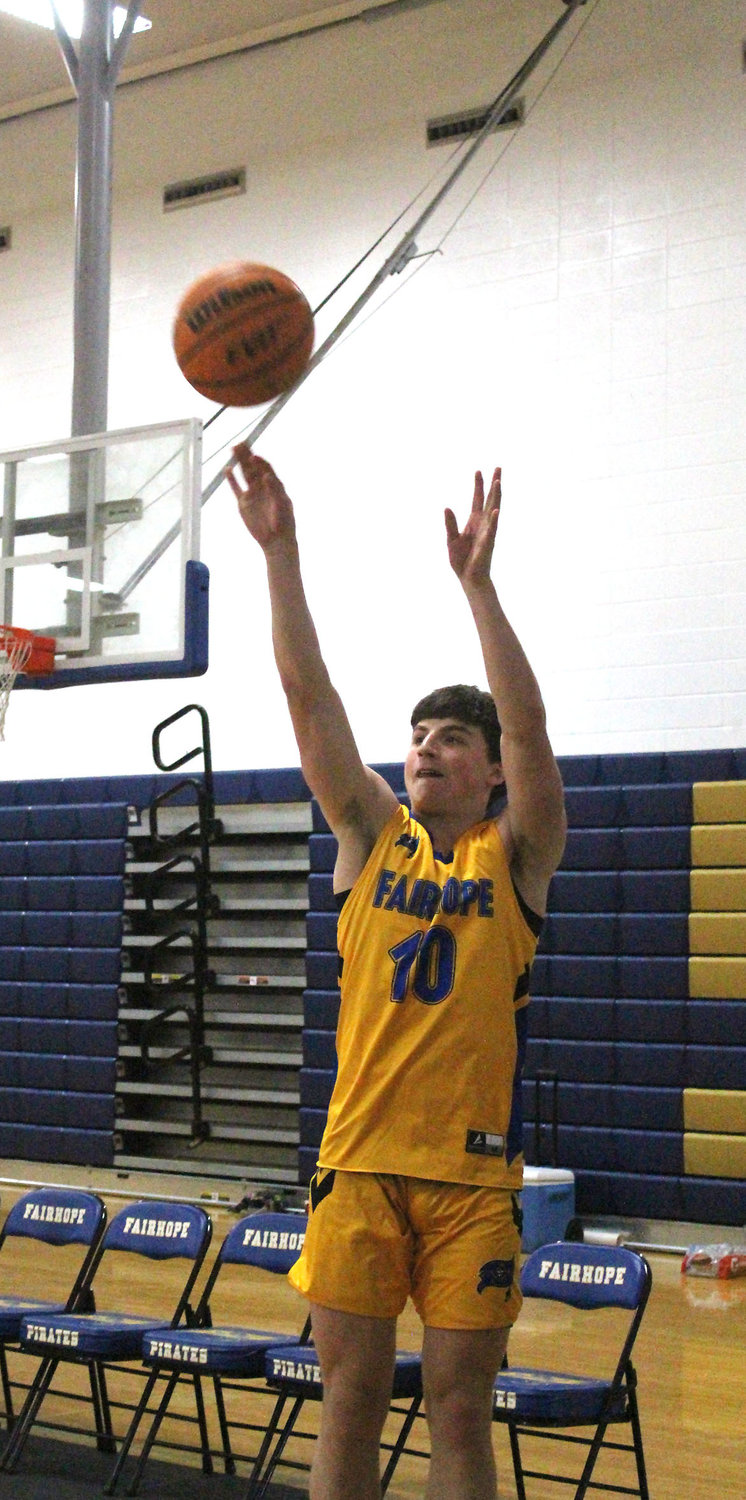 Fairhope junior Spence Sims fires a three-point shot from the corner as part of the Pirates’ offensive onslaught against the Vigor Wildcats in summer league action last Thursday, June 9, at home.