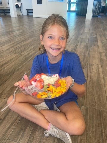 The culinary arts team made snack time creative and scrumptious as demonstrated by camper Isla Slay.