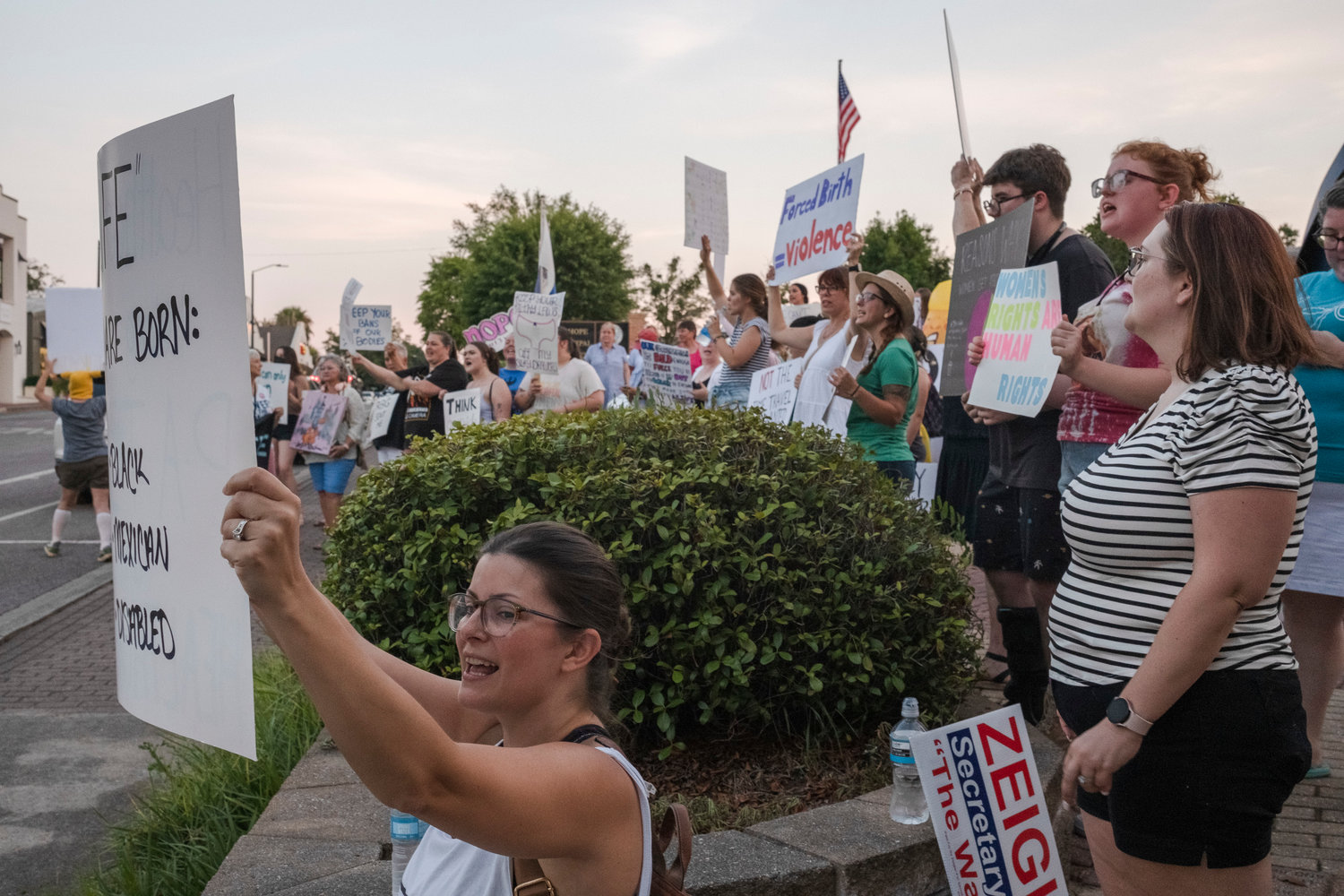 A group of protestors gather outside of the Fairhope Civic Center in opposition to the United States Supreme Court decision to overturn Roe v. Wade.