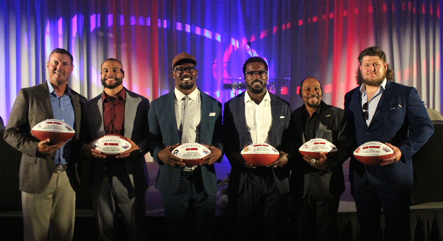 The Senior Bowl’s 33rd Hall of Fame class was honored during a ceremony at the Grand Hotel Golf Club & Spa in Point Clear Sunday night, June 26. Pictured from the left are inductees Philip Rivers, Dak Prescott, Von Miller, Patrick Willis and Kevin Faulk along with Rookie of the Year Creed Humphrey.