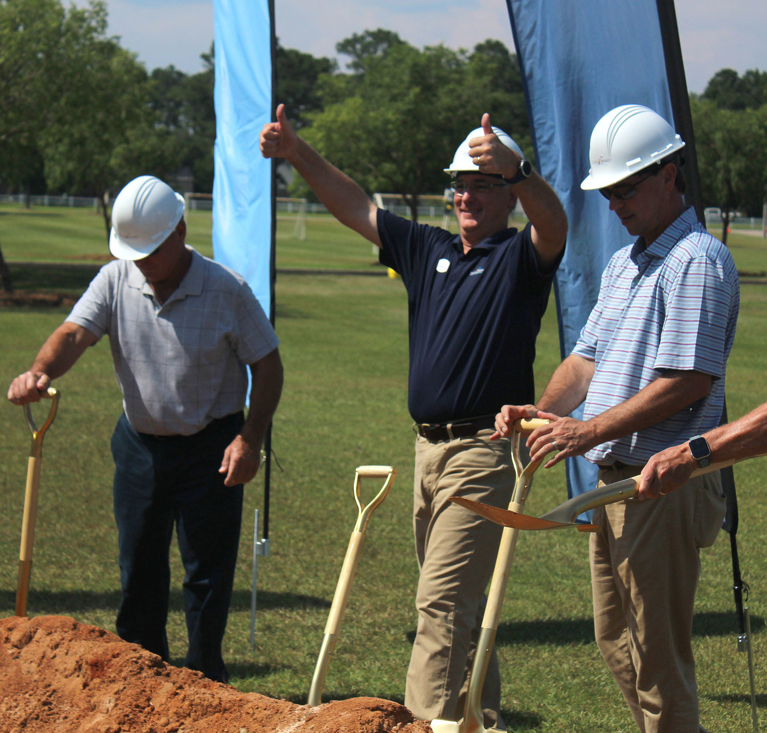 Grant Brown, public information officer and recreation and cultural affairs director for the City of Gulf Shores, gives a double thumbs-up after the June 22 groundbreaking ceremony that preceded construction of 12 pickleball courts at the Gulf Shores Sportsplex.
