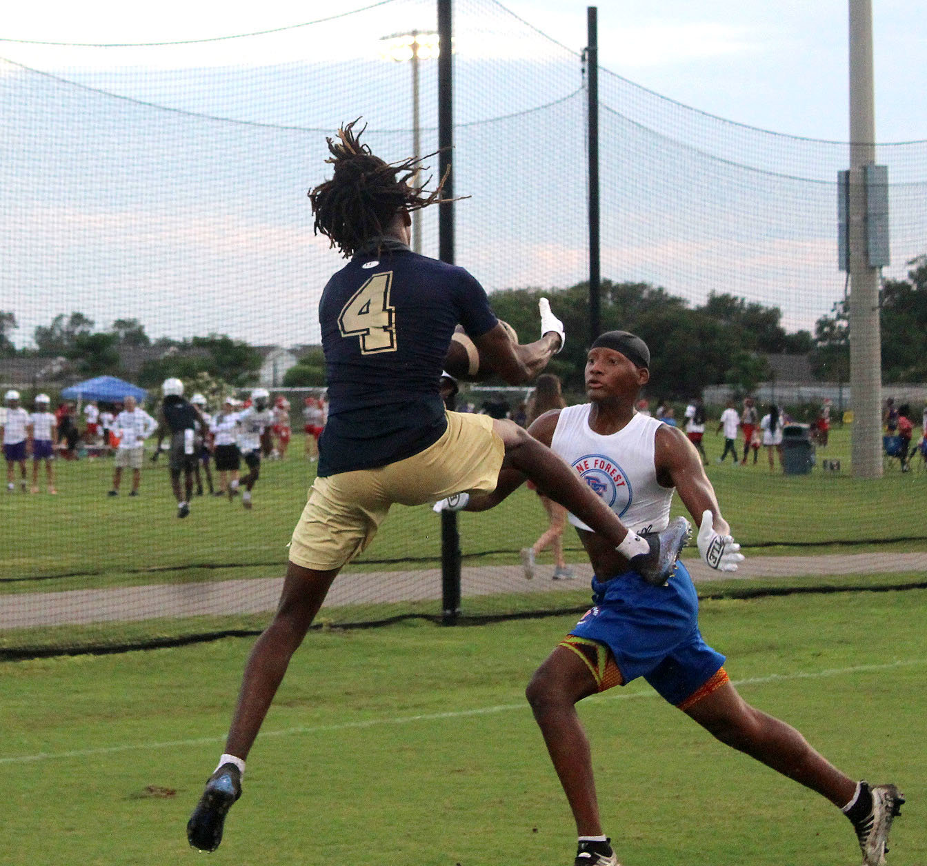 Foley receiver Makai Mitchell hauls in a touchdown pass in front of a Pine Forest defender in the Lions’ contest against the Eagles last Wednesday, June 29, on day one of the Foley 7-on-7 Showdown at OWA.