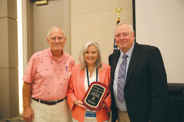 Dr. Cathleen "Cricket" Forester pictured with presenter, Dr. Andy Duke, left, and 2021-2022 ALMVA President Dr. Steven Murphree of Cullman.