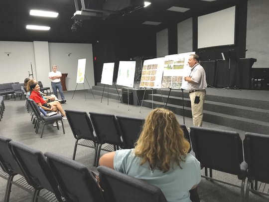 Buford King, assistant Baldwin County planning director, talks to local residents at a public meeting on the county long-range land use plan. The meeting in Elberta was one of four held July 11 and 12 to discuss the plan.
