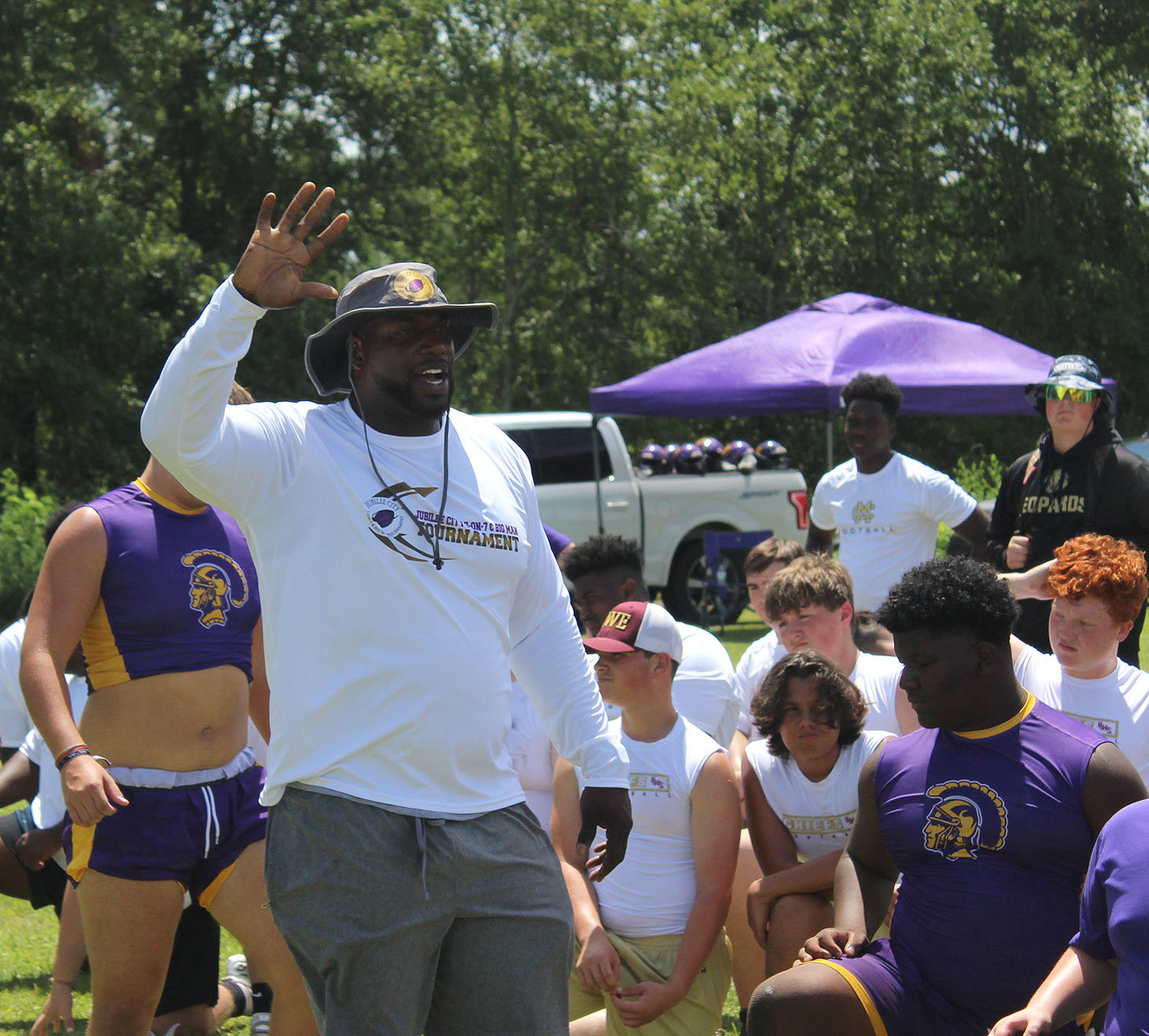Daphne Head Coach Kenny King lays down the ground rules for the obstacle course portion of the Big Man Tournament at the Al Trione Sports Complex July 14.
