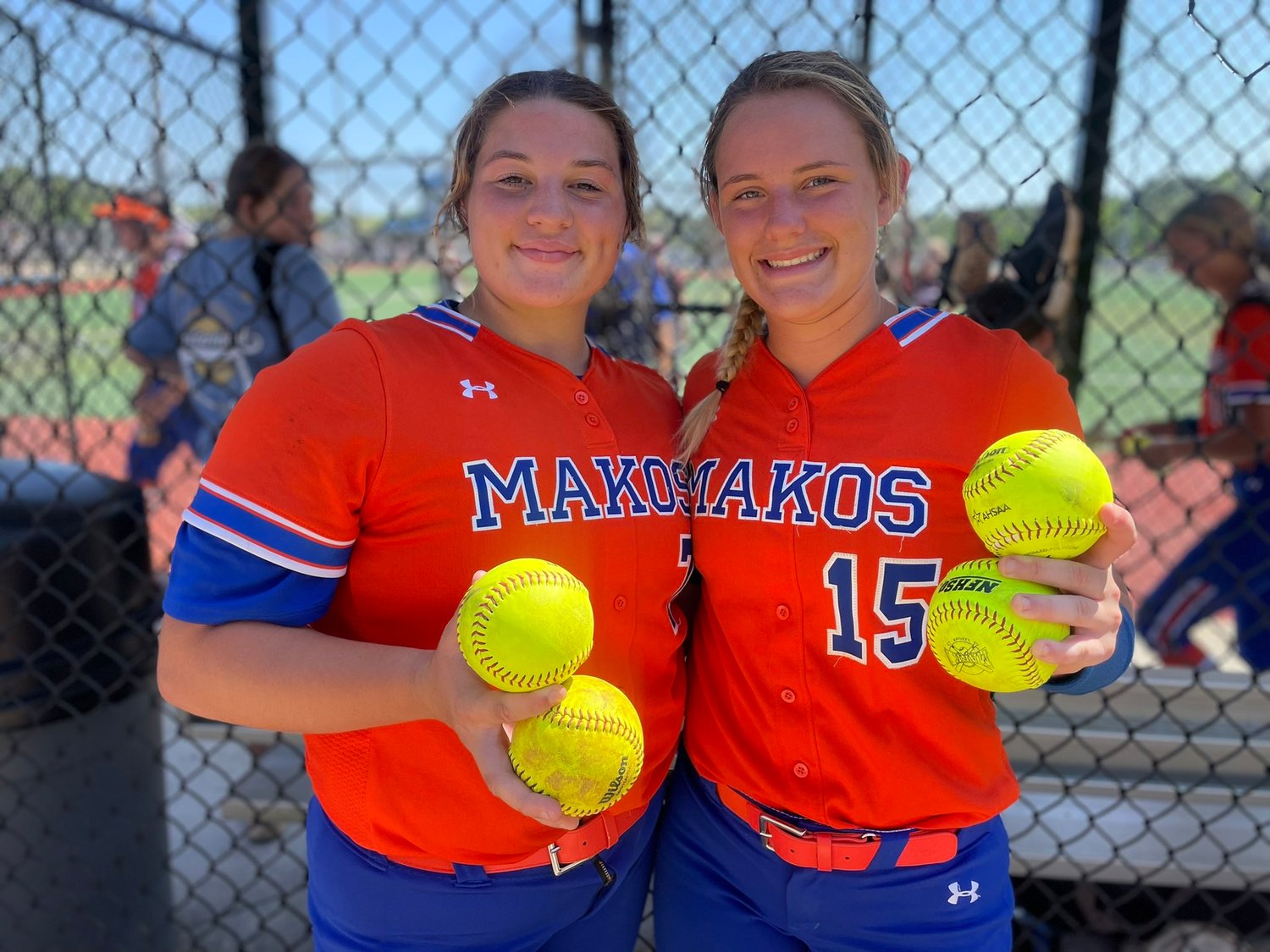 Orange Beach’s KG Favors and Ava Hodo show off their home run balls after they each mashed a pair during the regular season. Each was listed as a top prospect in their class in recent rankings from Legacy and Legends Softball.