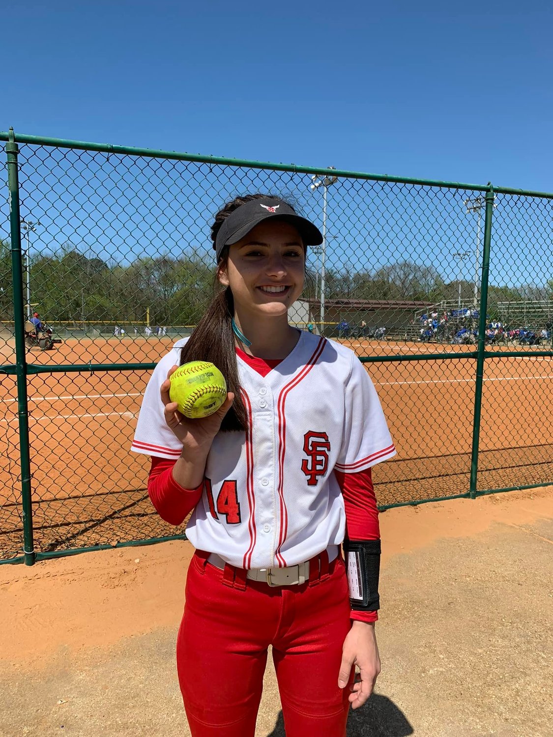 Spanish Fort’s Haley Hart poses with one of the home runs she hit for the Toros this regular season. Hart represented Spanish Fort in the Legacy and Legends Softball prospect rankings.