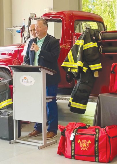 Dahne Mayor Robin LeJeune speaks at the announcement. The city purchased $280,000 in new protective equipment for the Daphne Fire Department.