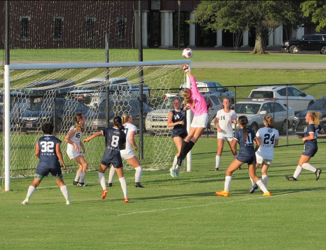 St. Michael Catholic’s Mimi Smith leaps to make one of her eight saves during the North-South All-Star game as part of AHSAA All-Star week in Montgomery.