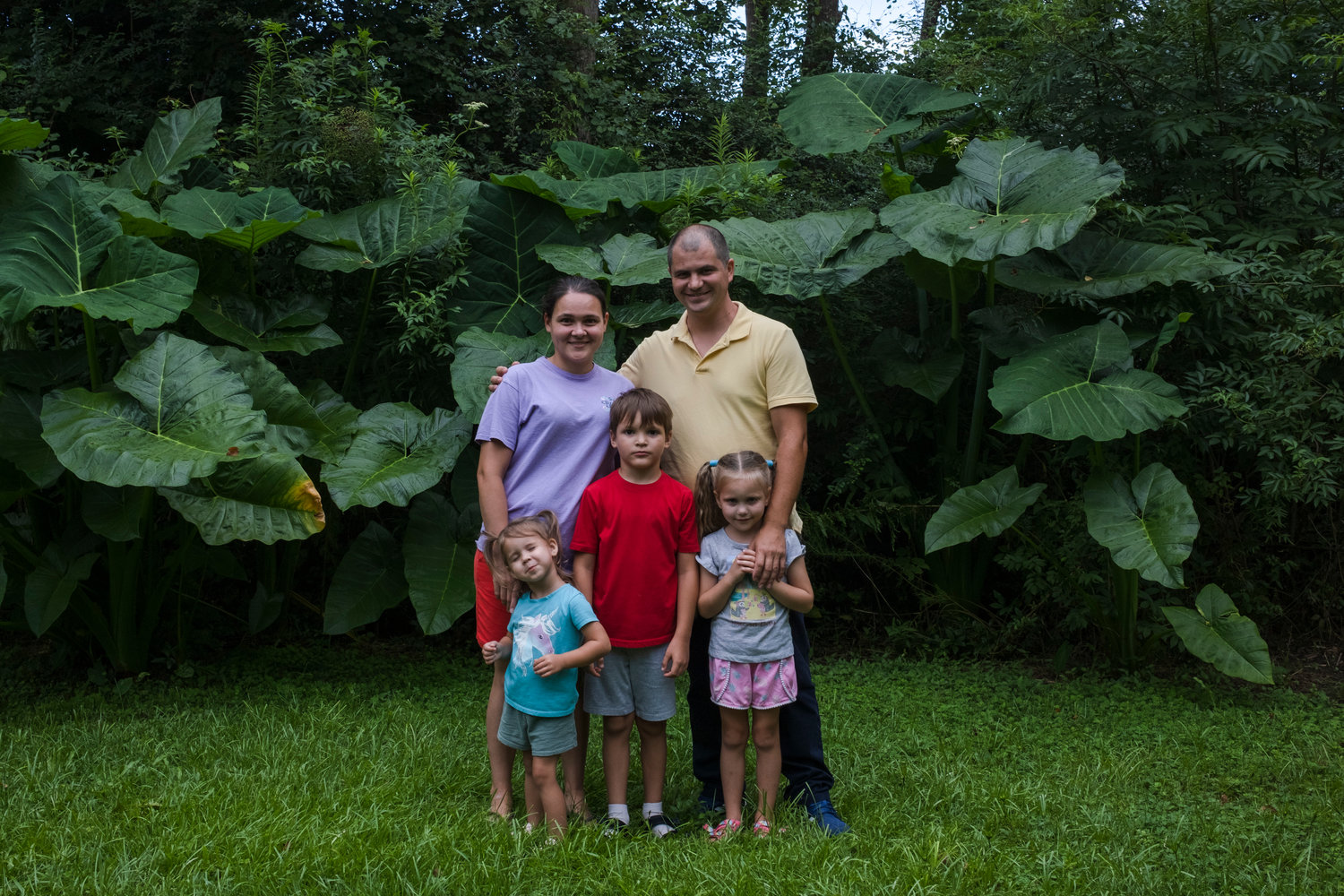 The Krokhmal family, new Robertsdale residents, in the backyard of the home they are staying in until they can find a rental. From left to right, parents Ira and Vitalii and children Victoria, 3, Masha, 6, and Oleg, 8.