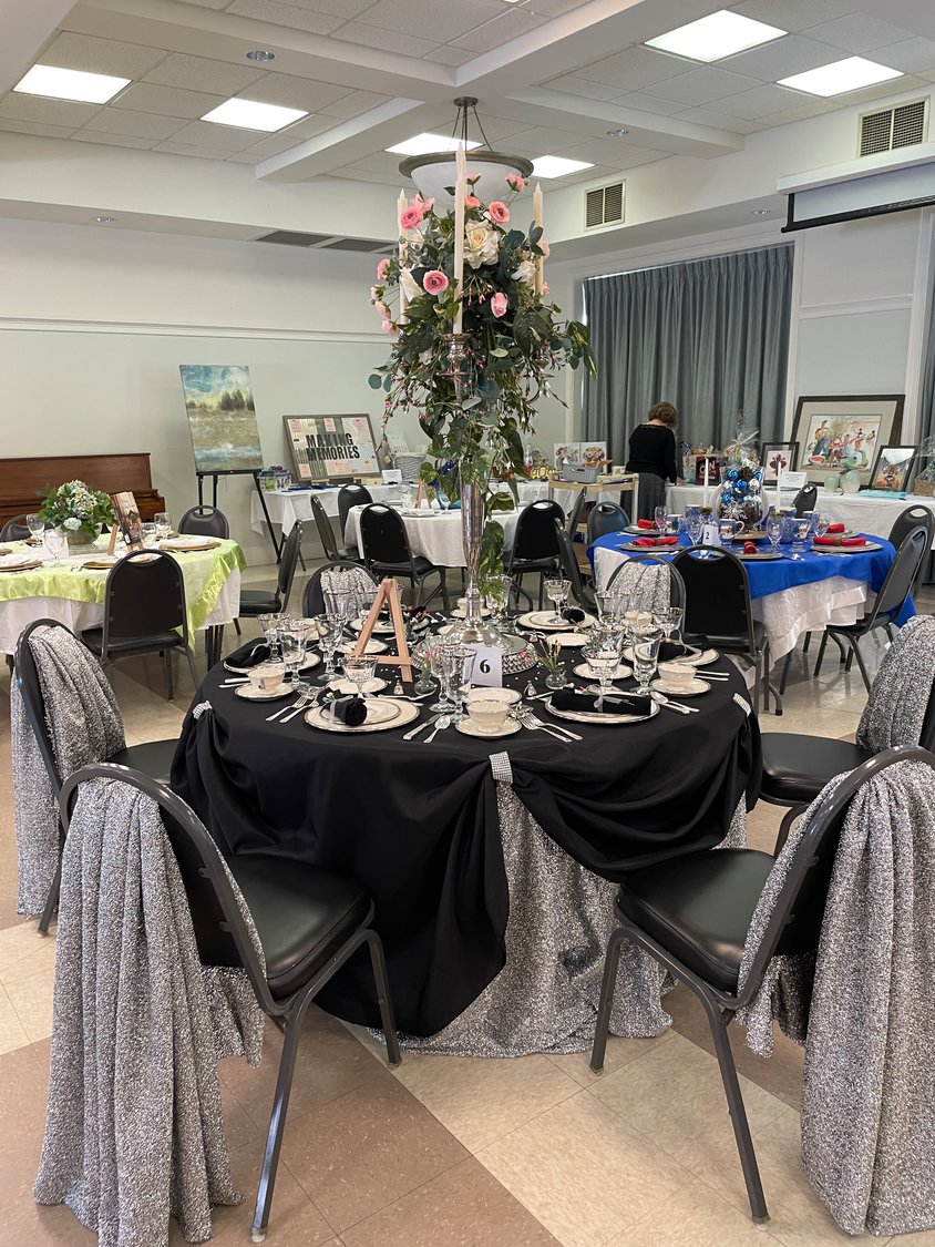 Club members and community volunteers decorated tables for the event, including this Elegance in the Making table, reminiscent of décor on the Downton Abbey show.
