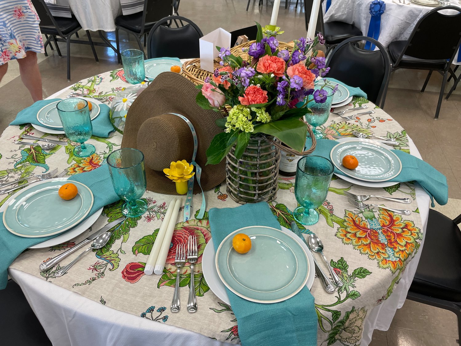 “Let’s Go on A Picnic” and “Alice in Wonderland” were two of the tables decorated by club members for the attendees who were treated to lunch, the interactive art demonstration and a silent auction. Proceeds from the event will benefit the many community endeavors of the club, including McKemie Place, Mary’s Shelter, Camille Place, Distinguished Young Woman and the William F. Green Veterans’ Home.