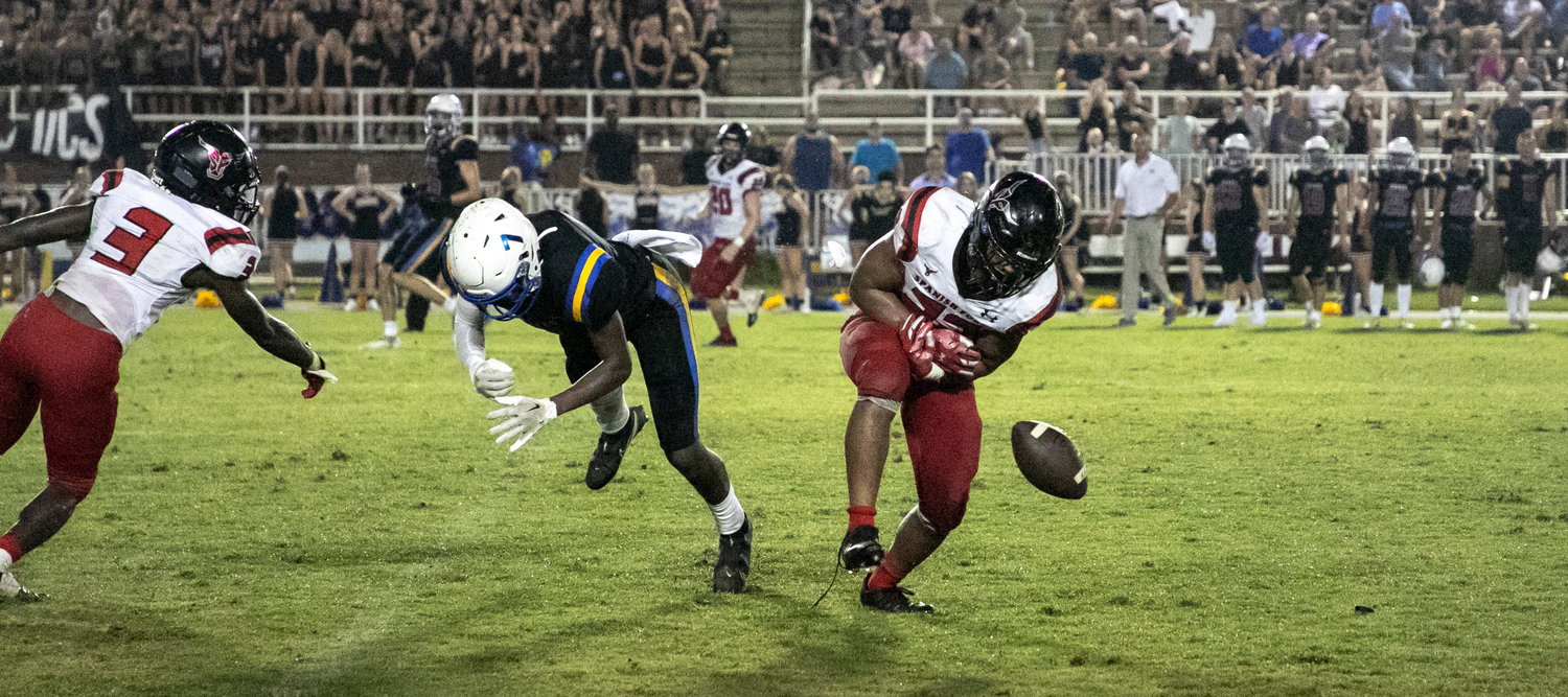 Toro senior JoJo Hixon breaks up a pass intended for Pirate receiver Andrew Rogers and just misses an interception during Friday's season opener in Fairhope.