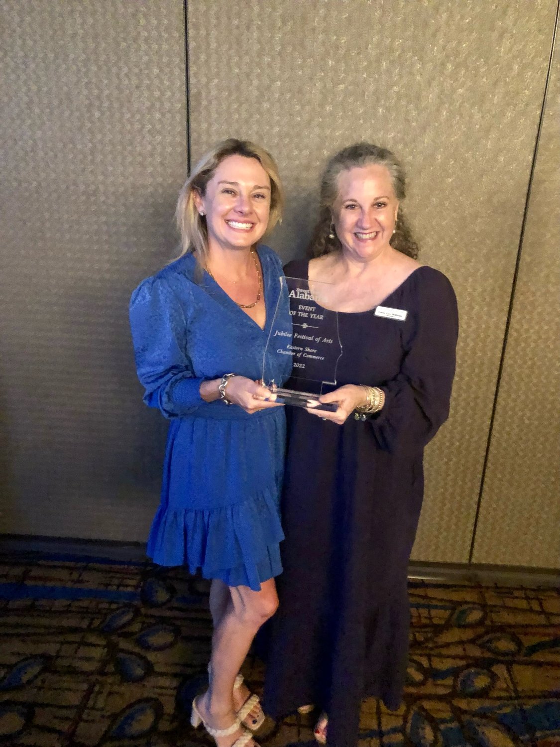 The Eastern Shore Chamber of Commerce’s Jubilee Festival of Arts received the 2022 State of Alabama Tourism Event of the Year Award. Receiving the award are, left, Liz Thomson, chamber director of Tourism and Special Events, and Casey Williams, chamber director.