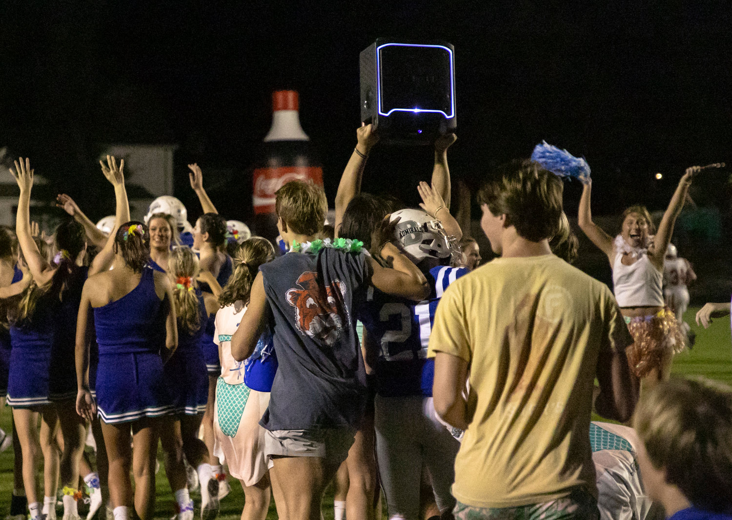 Bayside Academy fans stormed the field with a speaker to celebrate the Admirals’ 17-14 win over St. Michael Catholic Friday night on Freedom Field to open region play.