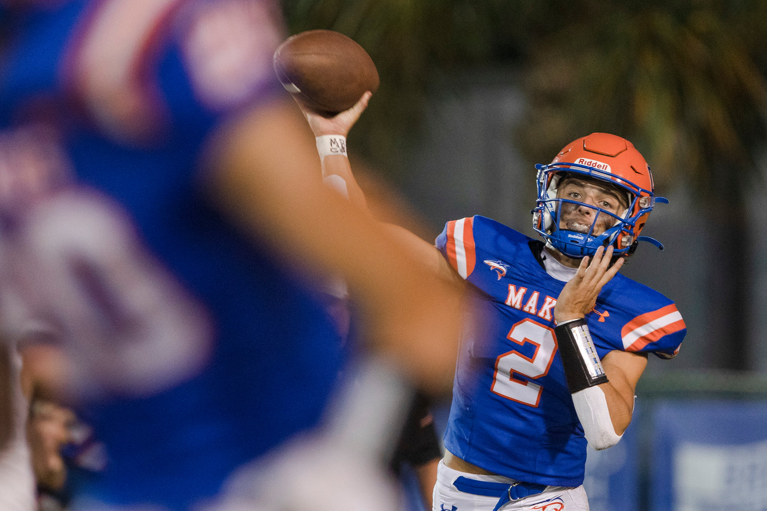 Orange Beach quarterback Cash Turner fires a throw during the Makos' first region game of the season at home against Jackson Friday night. Turner's late passing touchdown helped the hosts open region with a 31-14 win.