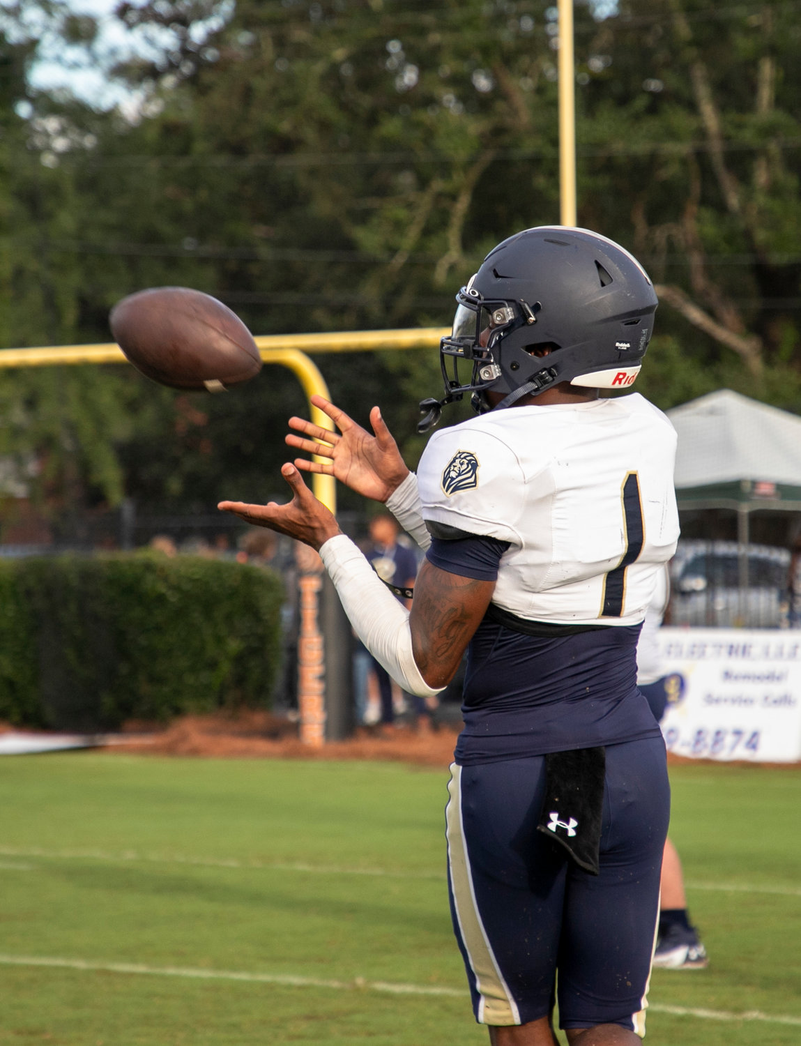 Foley receiver Perry Thompson looks in a catch during warmups before the Lions' non-region game against the Baldwin County Tigers Aug. 26 in Bay Minette. The Alabama commit hauled in three touchdowns Friday night to help the Lions beat MGM 43-42 in overtime to open region play.