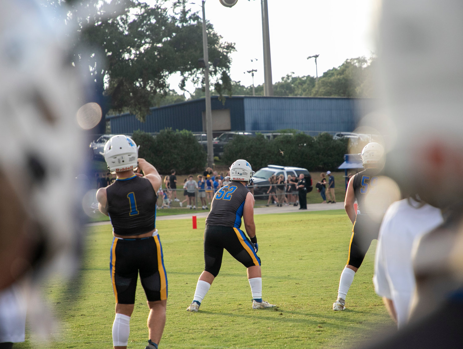 Fairhope quarterback Caden Creel (1) lifts a pass in warmups ahead of the Pirates' season-opening game against the Spanish Fort Toros Aug. 19 at home. Creel tossed a trio of touchdowns and ran for another to help Fairhope remain undefeated with a 43-39 win over Choctawhatchee.