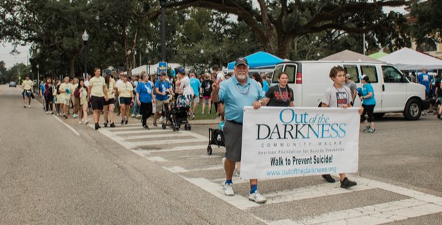 Participants walk in the annual South Alabama Out of Darkness Community Walk in Daphne each year. The event raises awareness for suicide prevention.