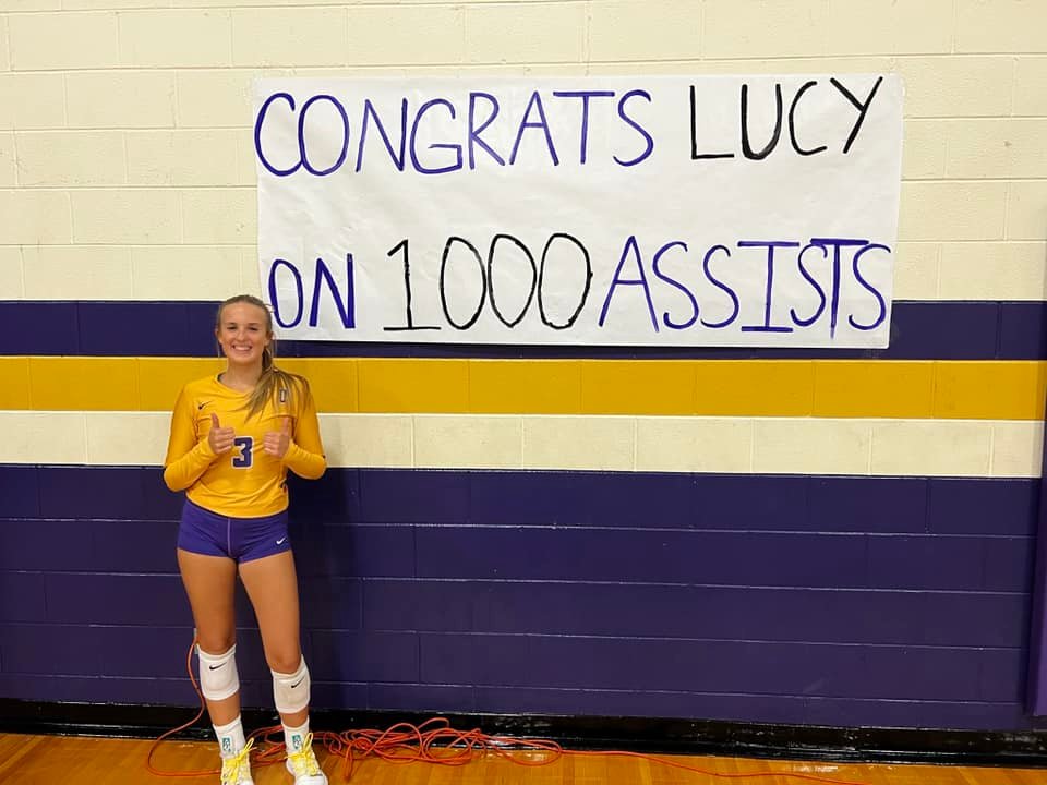 Daphne junior setter Lucy McCoy collected her 1,000th career assist on her home volleyball court Tuesday night, Sept. 13, in a tri-match against Bayside Academy and St. Michael Catholic.