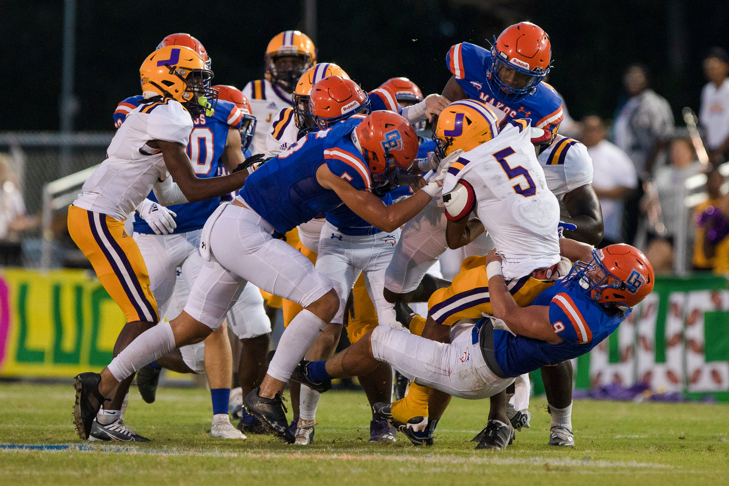 The Orange Beach defense swarms for a tackle in its region-opening win over Jackson Sept. 2 at home. In the school’s first season of being ranked, the Makos climbed to No. 8 in this week’s Class 4A rankings created by the Alabama Sports Writers Association.