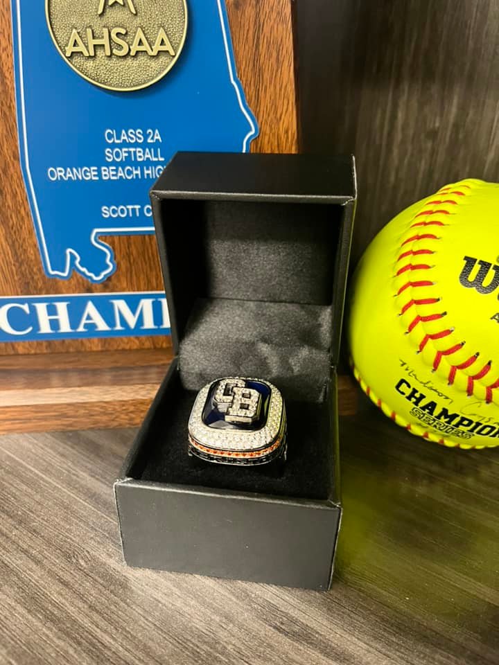 State-champion softball players in Orange Beach received their hardware for winning a second straight Blue Map trophy last spring.