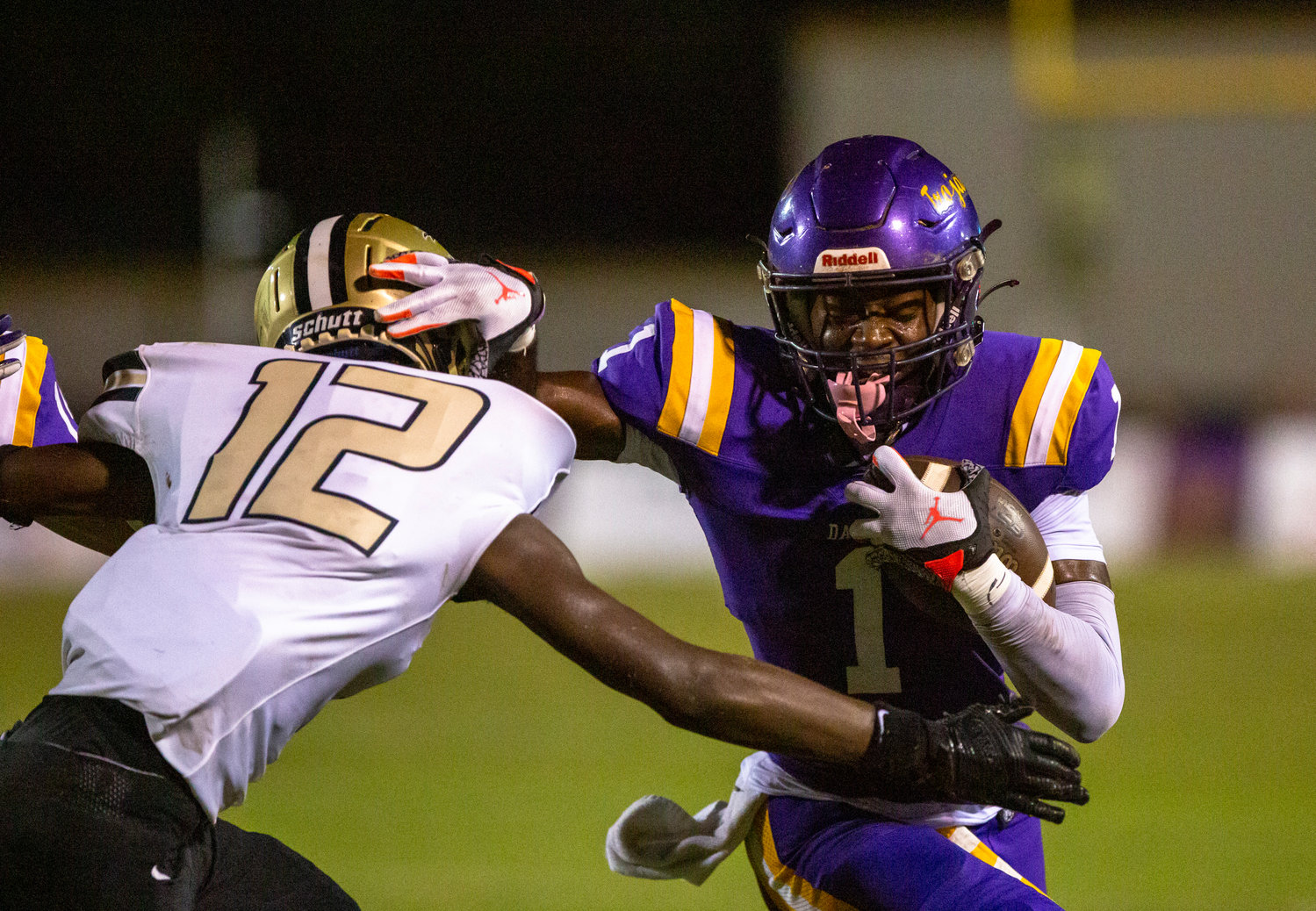 Daphne senior Stacey Boykins meets with a Davidson defender on the edge during the Trojans’ region contest against the Warriors at home Sept. 9. Daphne is looking for a third straight win Friday against Baker back at home.