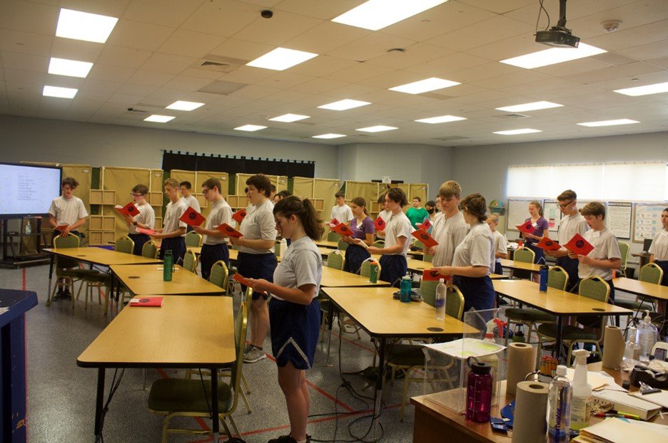 Cadets recite the Cadet Code on day 2 of New Cadet Academy in the JROTC classroom at Daphne High School.
