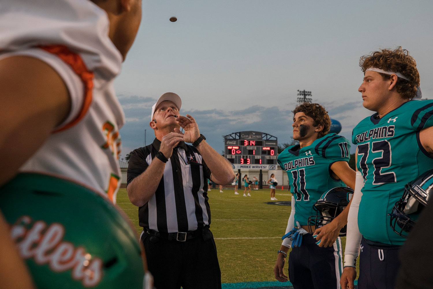 Gulf Shores captains John Tuberville and Tyler Schepker watch the coin toss before the Dolphins’ region game against the LeFlore Rattlers Sept. 16 at home. No. 7 Gulf Shores hosts Murphy this Friday in non-region action back at Mickey Miller Blackwell Stadium.