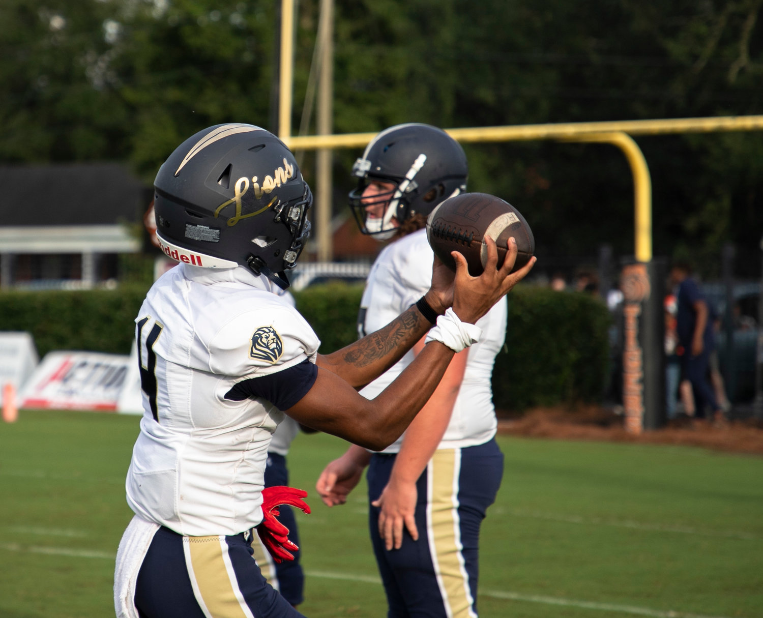 Foley receiver Makai Mitchell looks in a pass during warmups before the Lions’ non-region game against the Baldwin County Tigers Aug. 26 in Bay Minette. Foley hosts the No. 3 Saraland Spartans this Friday in another non-region battle.