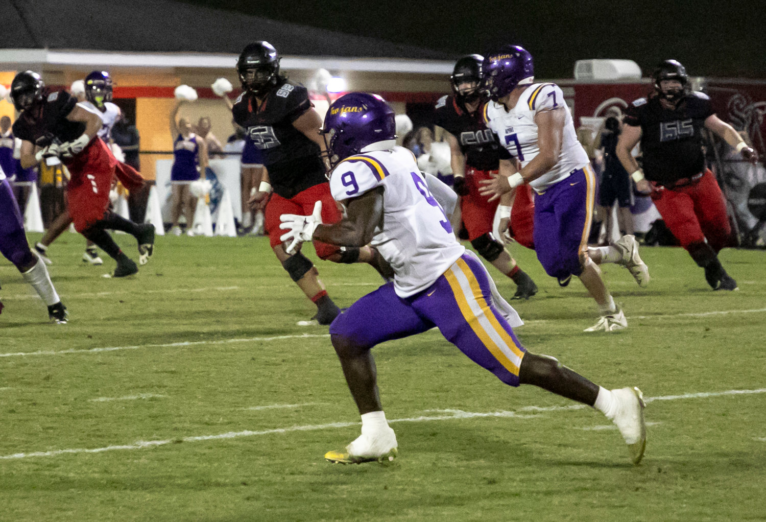 Daphne senior Cam Long races an interception the other way during the Trojans’ non-region away contest against the Spanish Fort Toros Friday, Sept. 23.