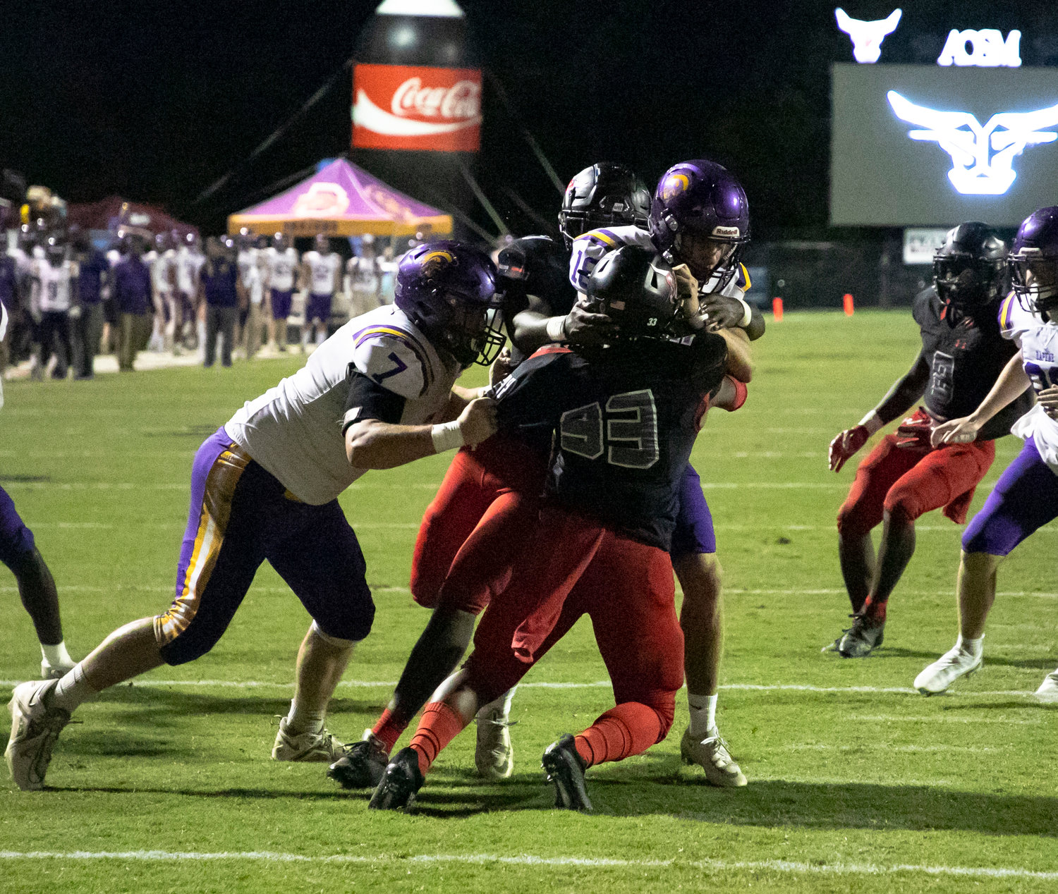 Toro senior Josiah Hixon converges with Daphne’s Baylor Beard on a two-point attempt in the second quarter of the non-region contest at Spanish Fort Stadium Friday, Sept. 23. The Toro defense came up with six third-down stops in the second half to help secure an 18-15, rivalry win.