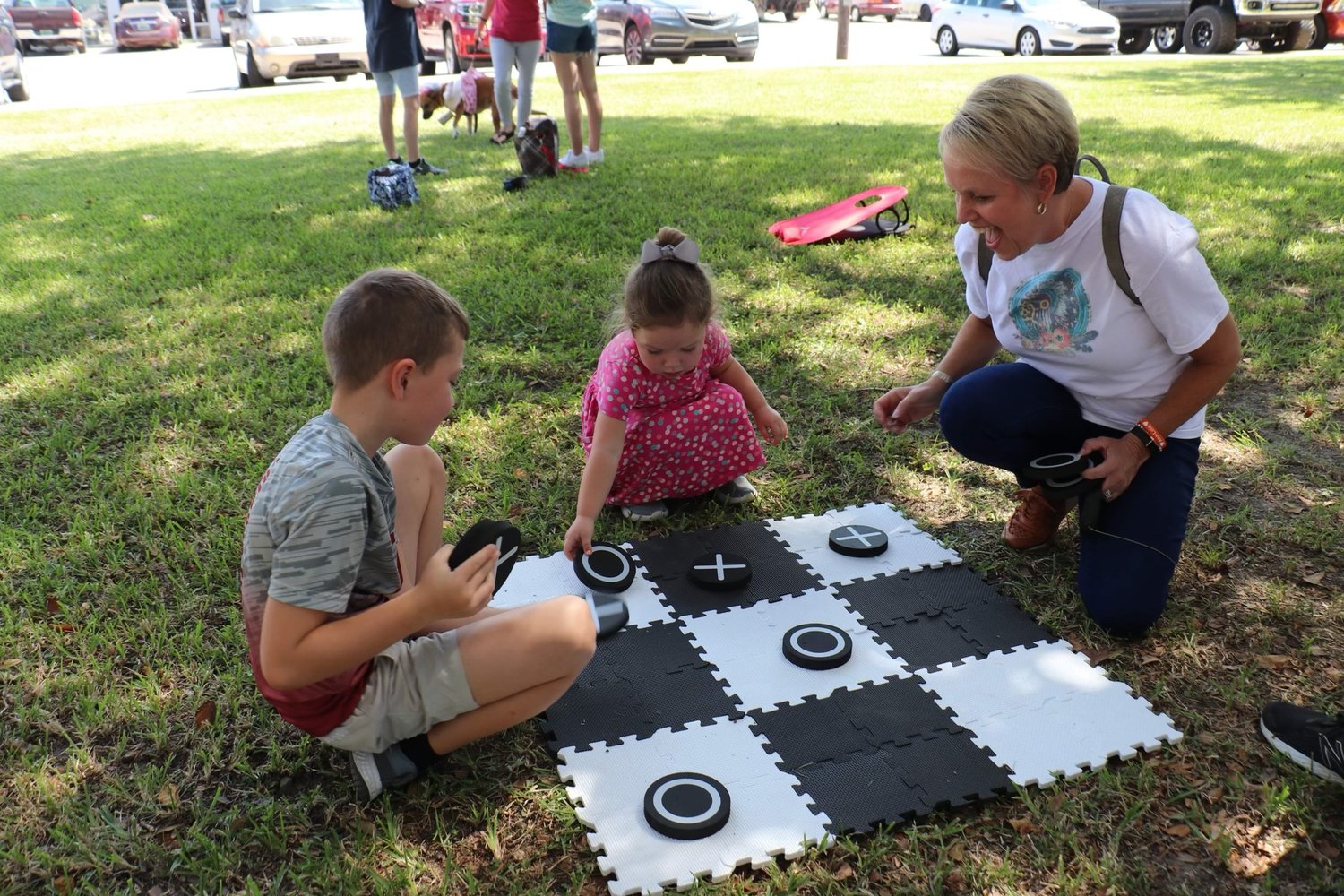 Families filled Blackburn Park Saturday for the Dogs on Hand event and enjoyed games, food and lots of dogs.